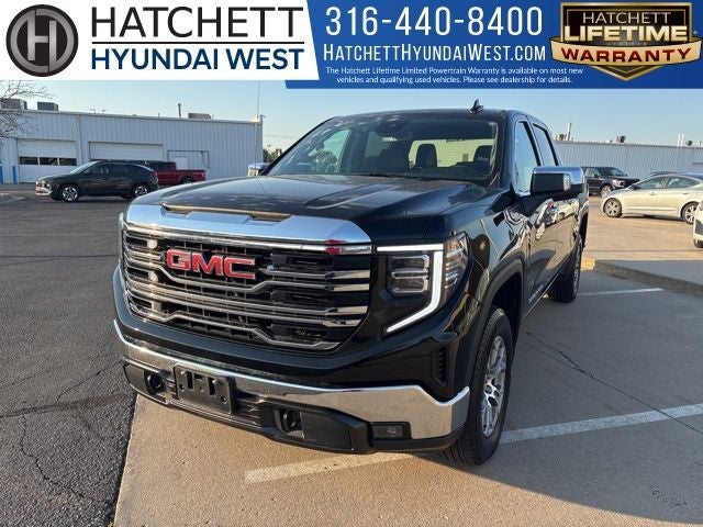 2025 GMC Sierra 1500 SLT in Onyx Black — front three-quarter view