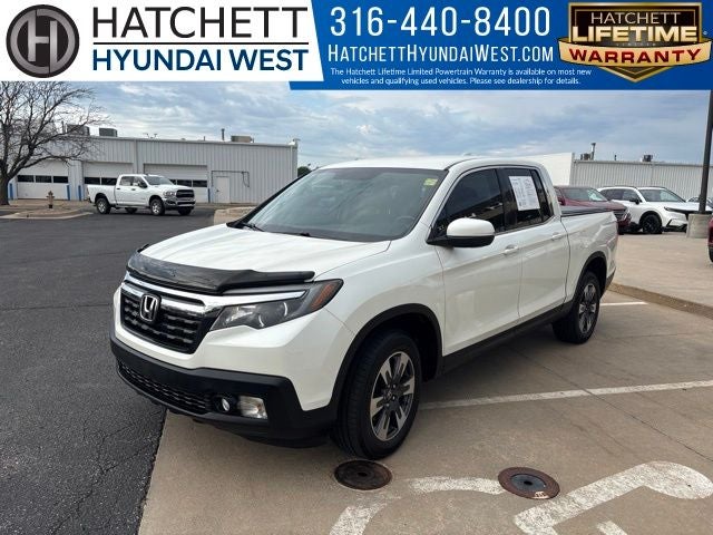 2017 Honda Ridgeline RTL in Diamond White Pearl — front three-quarter view
