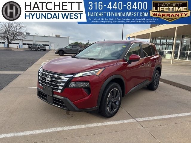 2025 Nissan Rogue SV in Scarlet Ember Tintcoat — front three-quarter view